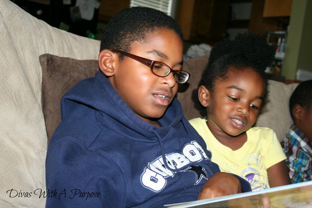 Invest In Childhood | Siblings Reading