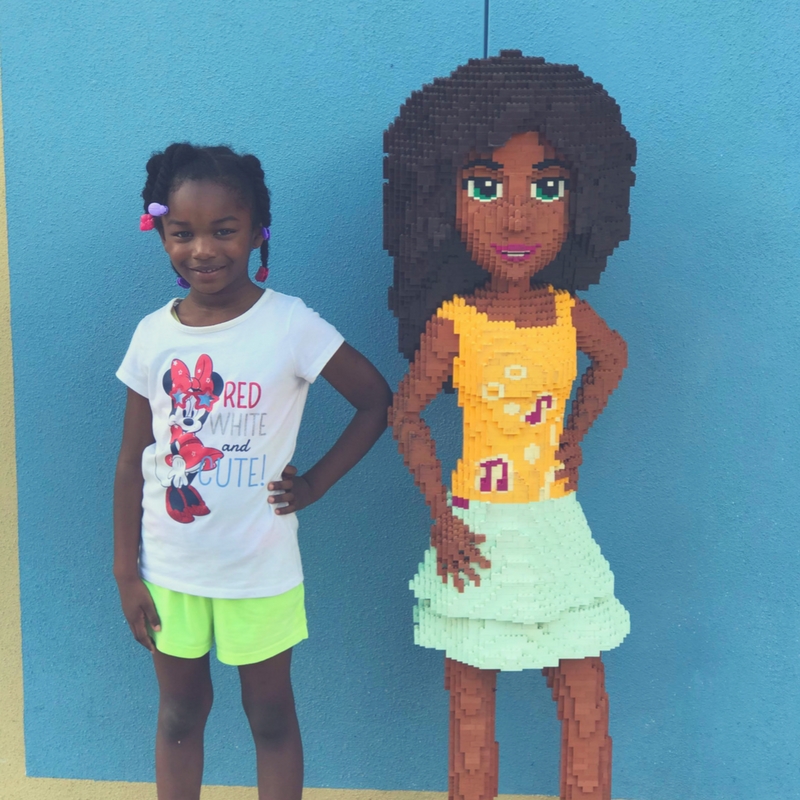 Posing with the figurines at LEGOLAND Florida