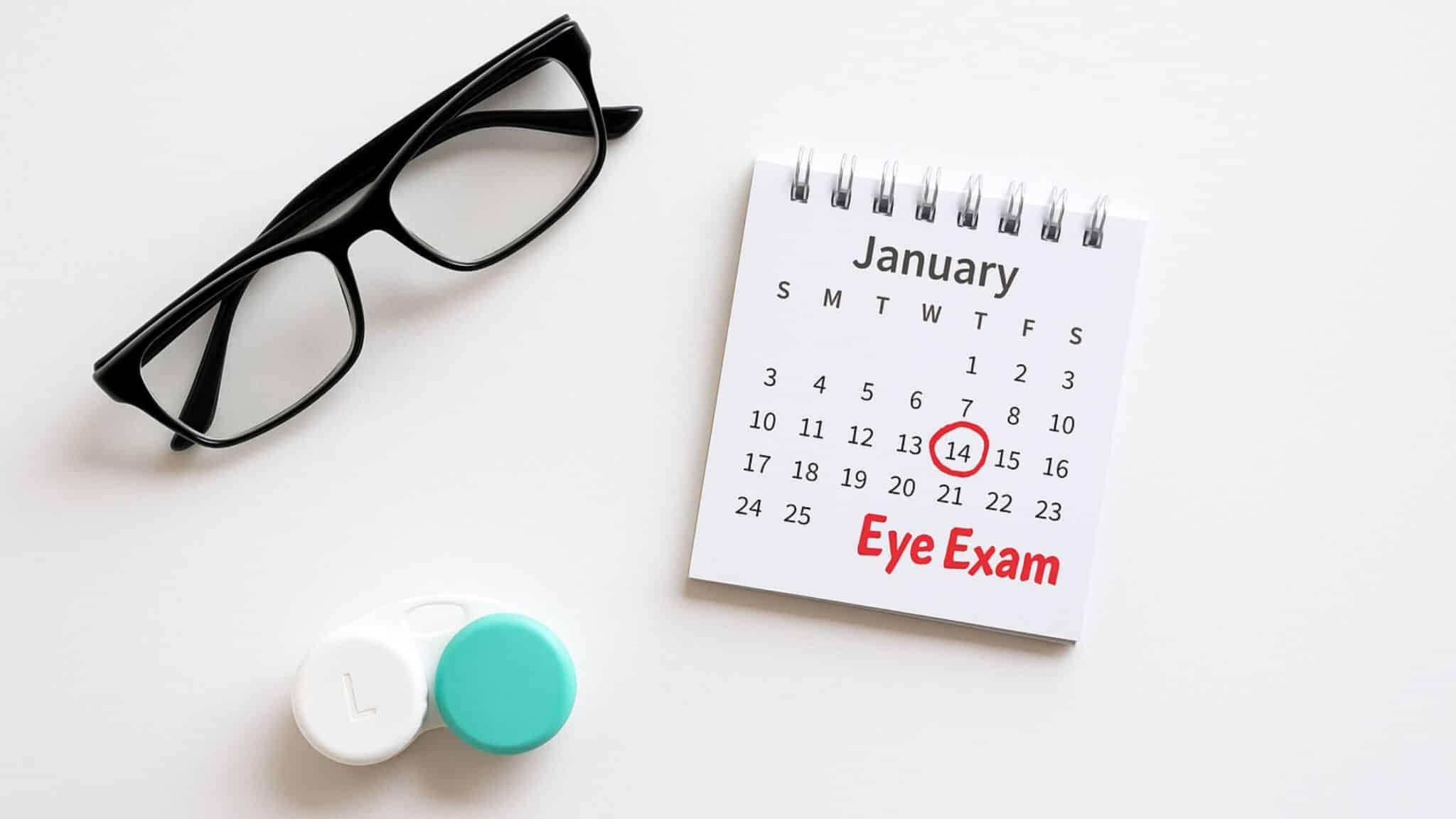 Calendar reminder with glasses and contacts symbolizing annual eye care routine.
