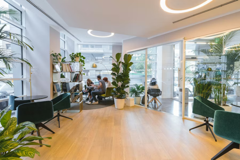 Bright modern office with plants and flexible seating designed for creative work