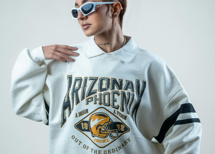 Model wearing professionally printed custom sweatshirt created without owning a printer