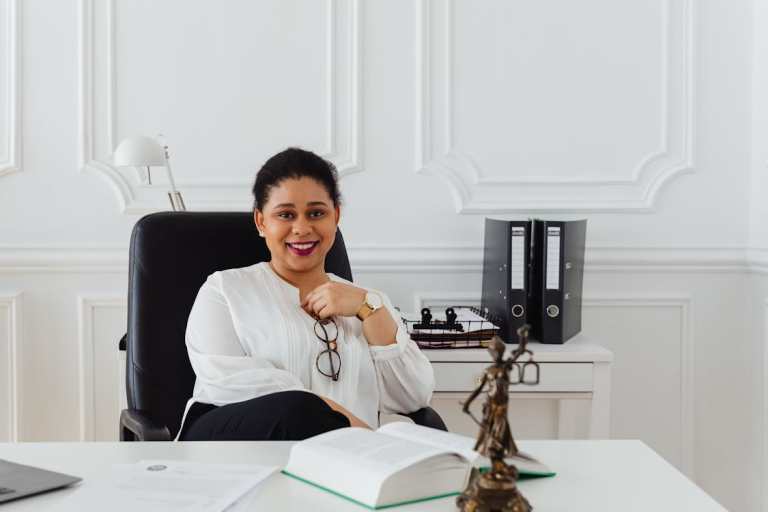 Attorney seated at a desk in a modern office, representing law firm growth and marketing strategy