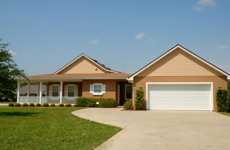 Home driveway showing smooth concrete surface and proper drainage slope