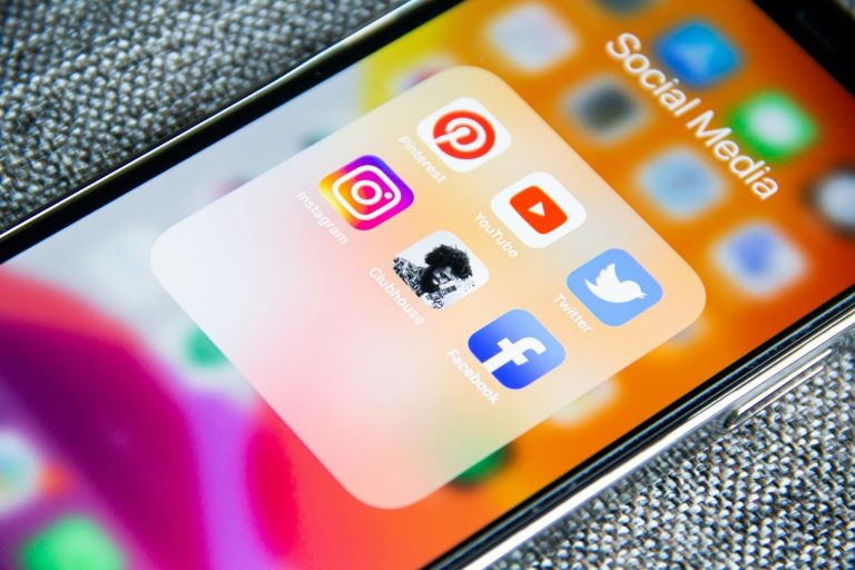 Smartphone screen showing social media apps used as part of efforts to improve marketing campaigns