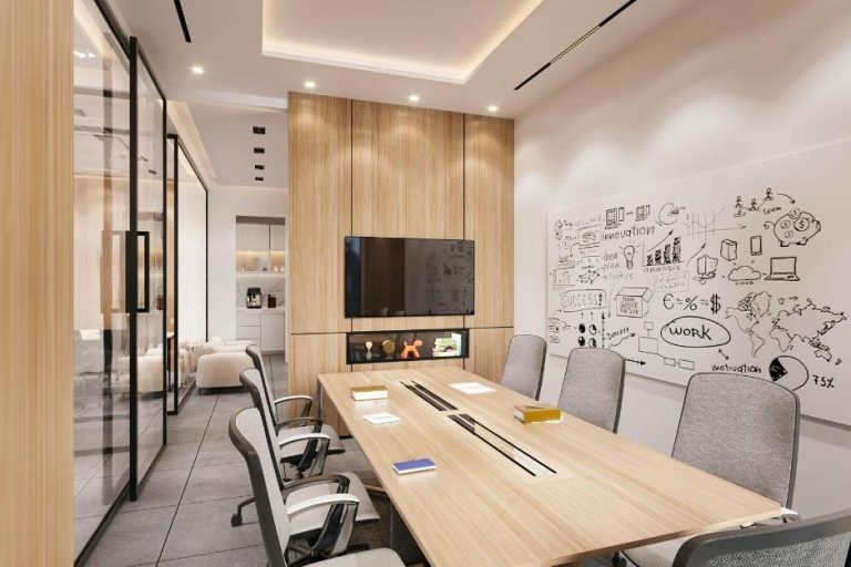 Modern executive conference room with integrated display, collaboration whiteboard, and AV system setup