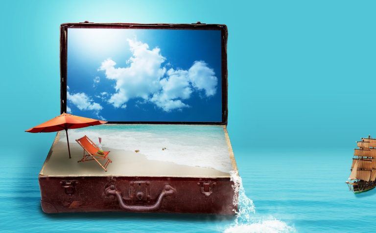 Open suitcase revealing a beach scene with ocean, umbrella, and sky symbolizing innovation changing the future of travel
