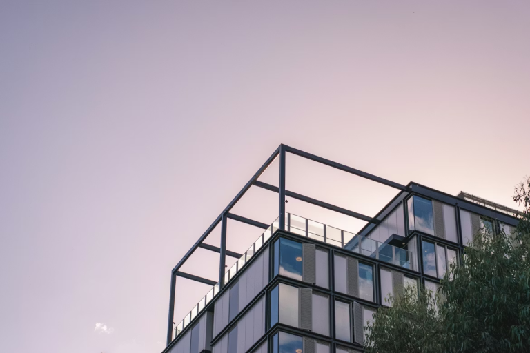 Modern multi-story residential building representing residential real estate investment opportunities
