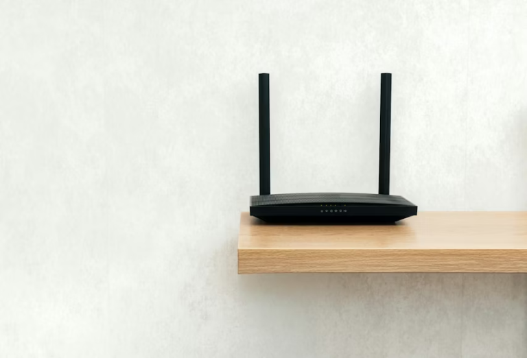 Wireless internet router on a wooden shelf, representing home internet setup during a move