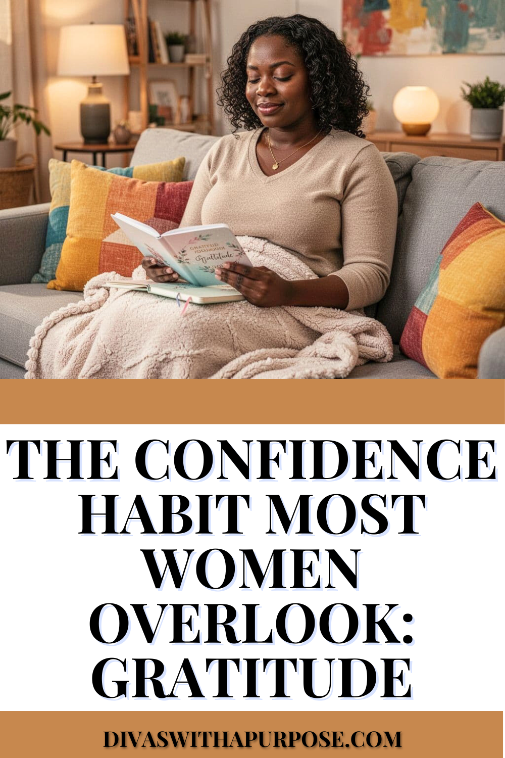 Black woman sitting on a couch wrapped in a blanket, reading a gratitude journal in a warm and cozy living room, with text overlay about gratitude as a confidence habit