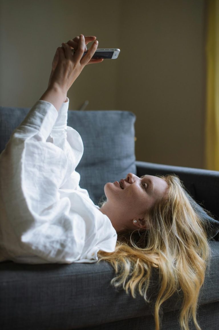 woman checking her phone for an unknown call