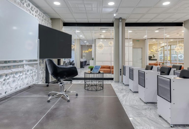 modern office interior with clean design, seating area, and minimalist workspace