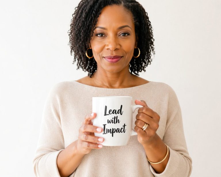 Black woman holding mug that says lead with impact representing female leadership and communication