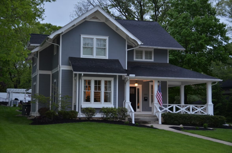 well maintained home exterior with front porch and landscaping that appeals to buyers