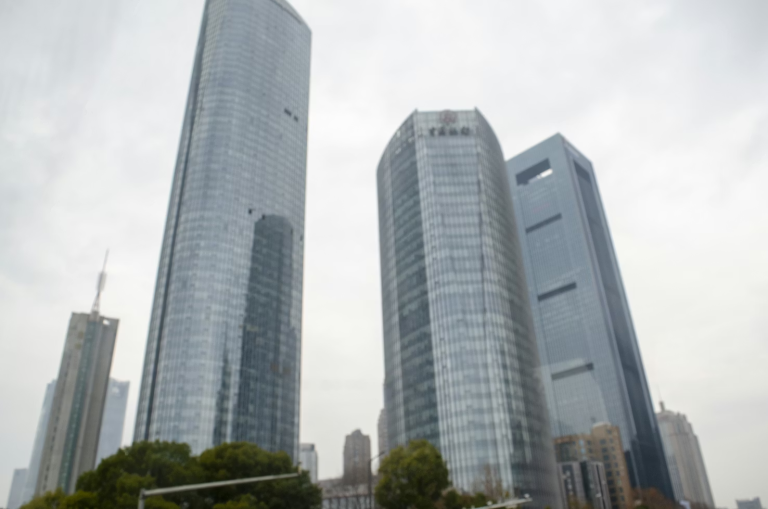 Modern city skyscrapers representing investing in a second home overseas and foreign real estate opportunities.