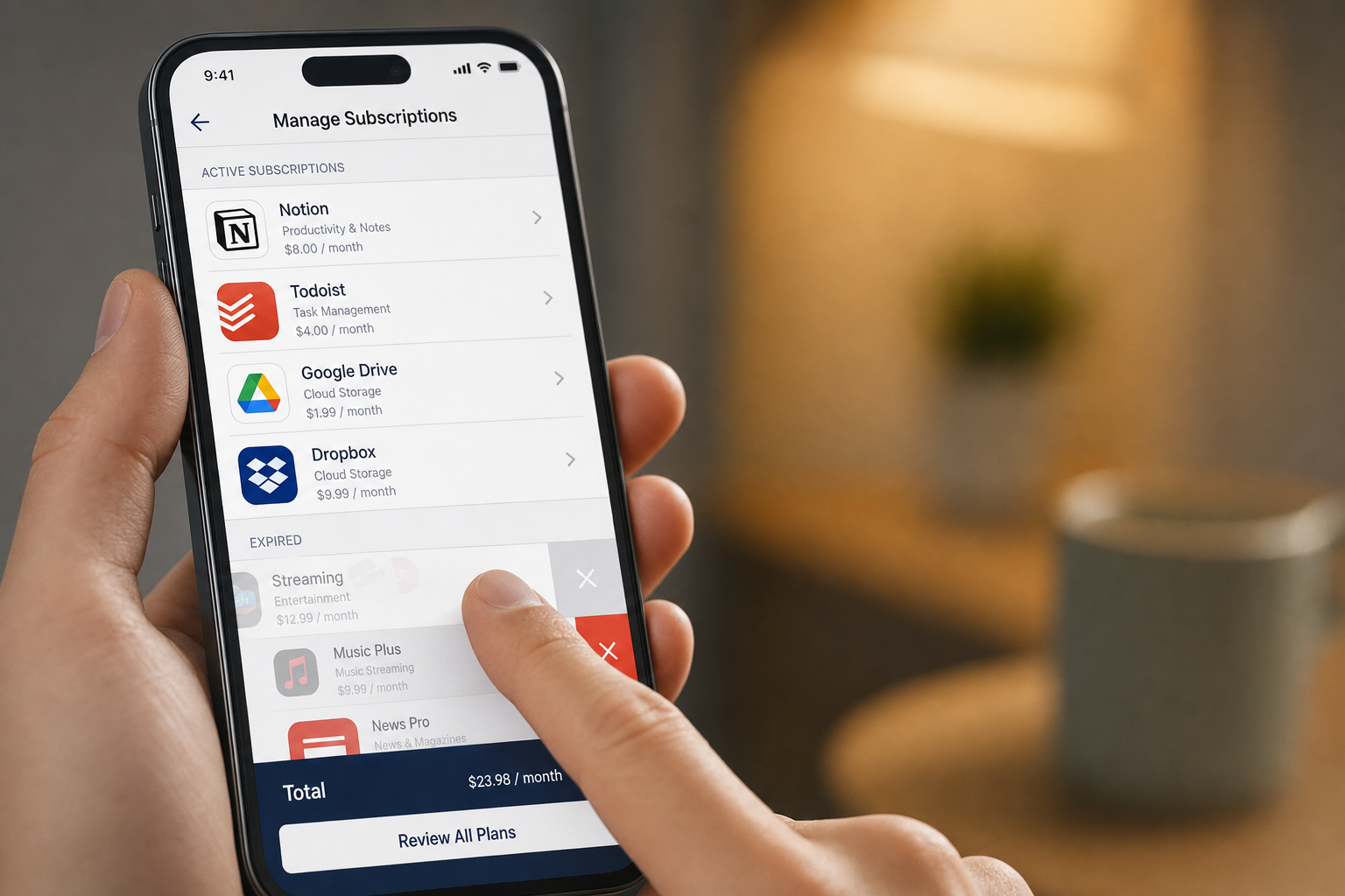 Smartphone displaying active software subscriptions and recurring app expenses.