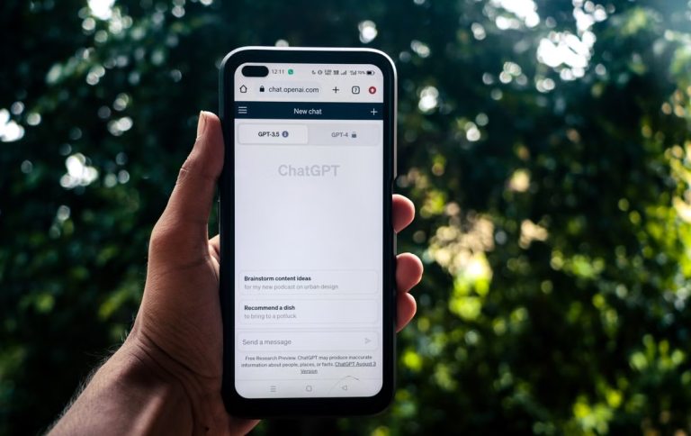 Smartphone displaying ChatGPT interface, representing AI search tools and generative search technology for businesses