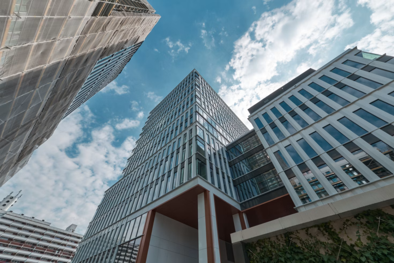 Modern commercial office buildings in a city business district, representing the importance of choosing the right business location for long-term growth.