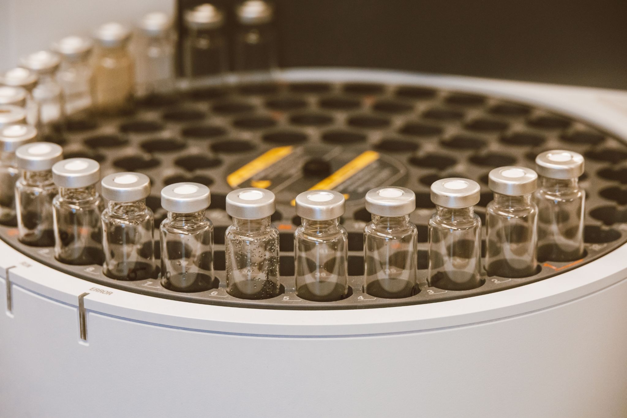 Glass vials on centrifuge machine