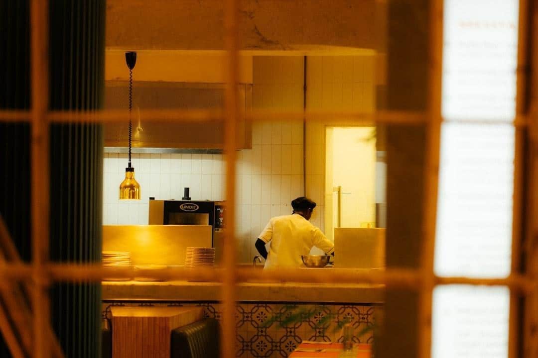 A chef working in a commercial kitchen