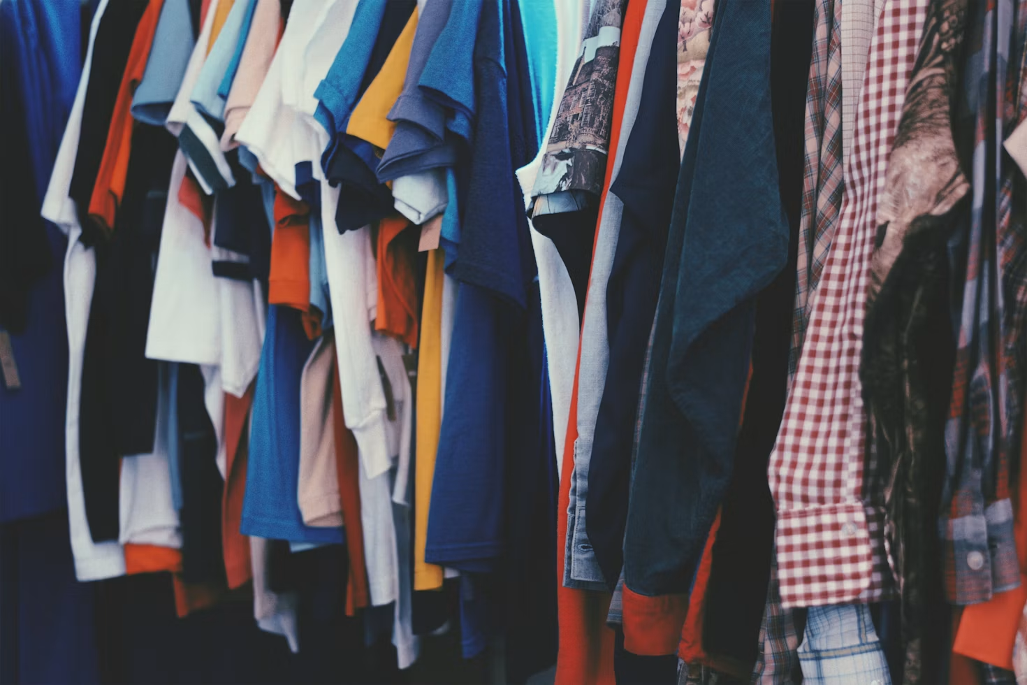 Colorful clothing hanging in a wardrobe for creating coordinated outfits